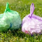 Garbage bags on a field grass