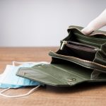 woman holding an empty wallet