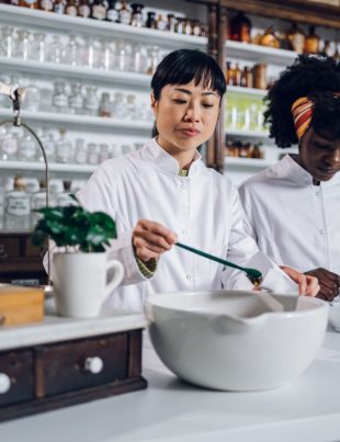 Workers of the OEM chocolate manufacturer doing supplement manufacture formulation