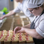 Professional chef decorates desserts during bakery and pastry culinary course in kl of a diploma patisserie programme