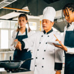 professional asian senior chef teaches in culinary academy of culinary chef course in kl malaysia