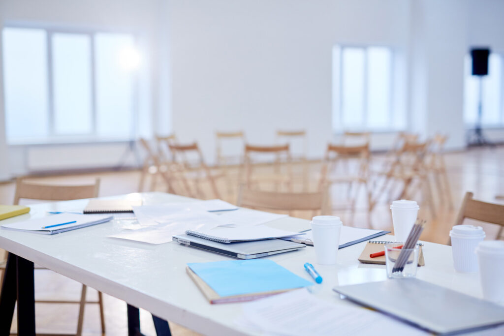 A vibrant room filled with chairs and notes for a corporate training courses Malaysia session.